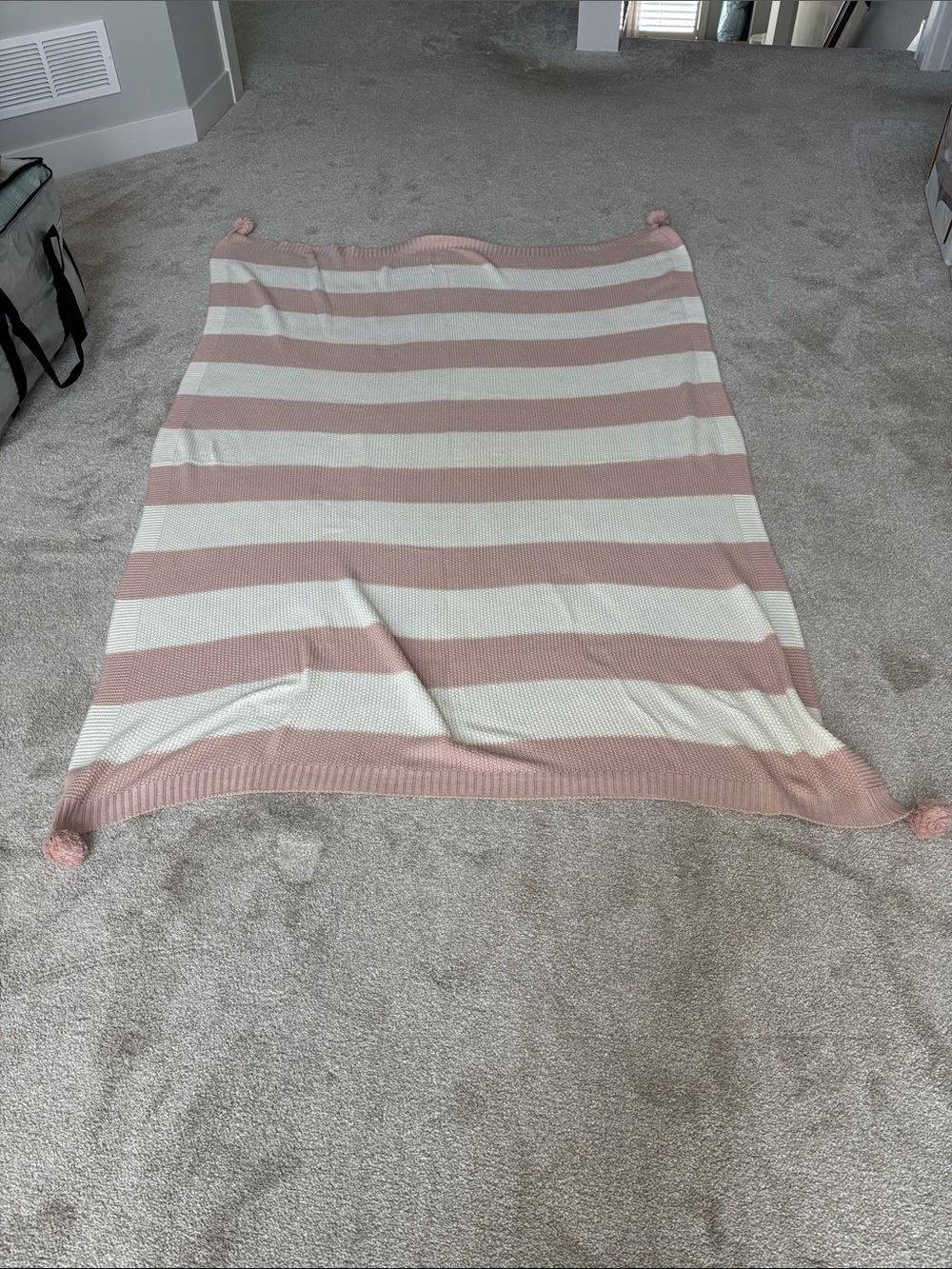 Pottery Barn Teen Pink and Cream Striped Blanket w/poms on the corners